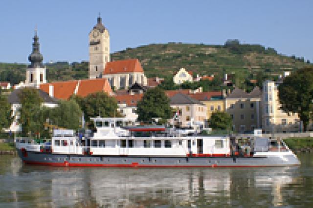 a small boat in a large body of water