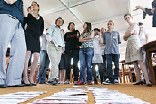 A group of people discussing 