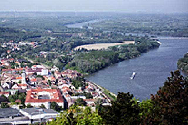 A view of a large body of water with a city in the background