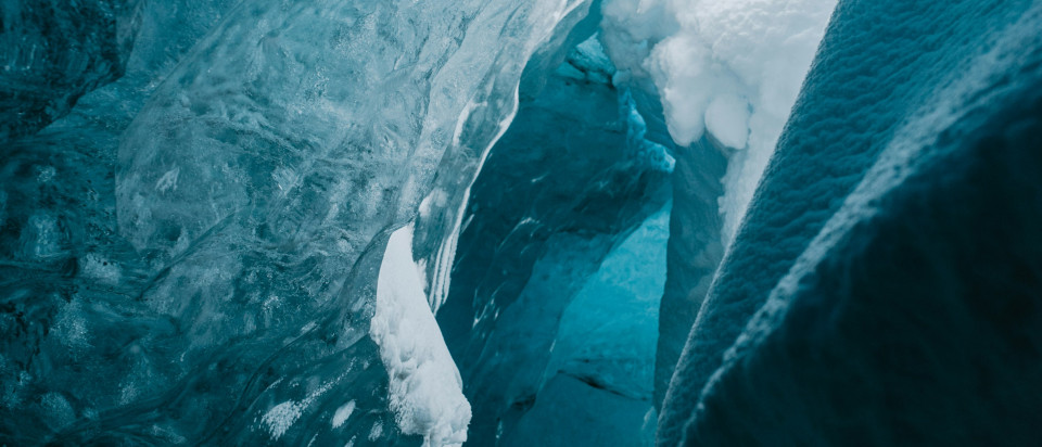 a lot of ice on a glacier that is melting down 